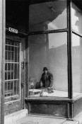 Man in empty storefront