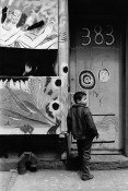 Boy with store mural