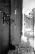clock and hook with reflection of kid