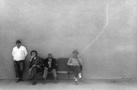 Smokers on bench, Columbia Fall, Mont. 1963